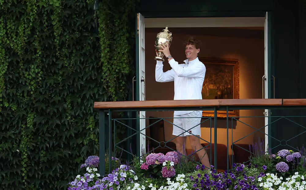Jannik Sinner holds Wimbledon 2025 trophy for the first time.